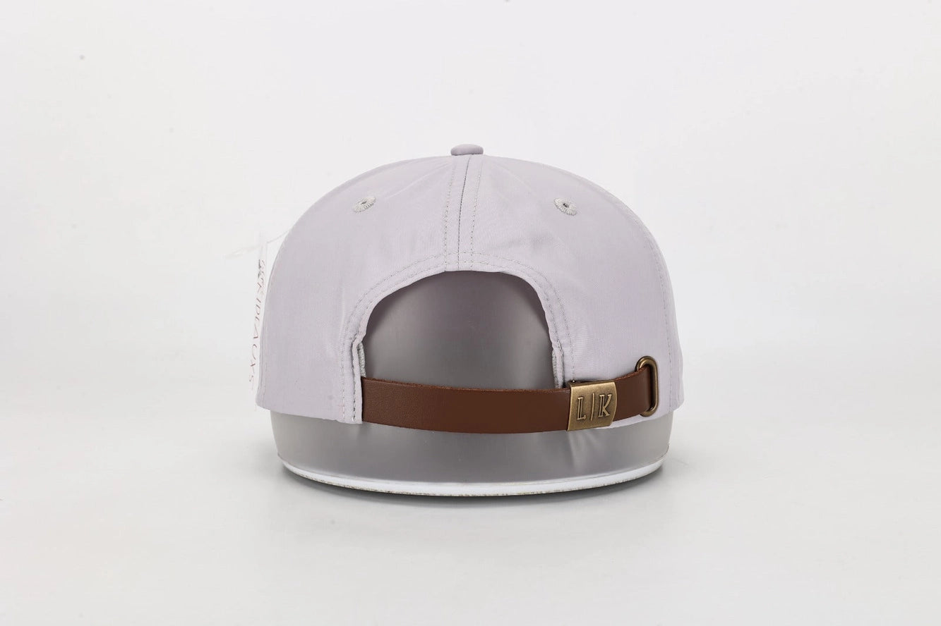 Boys white hat with adjustable strap