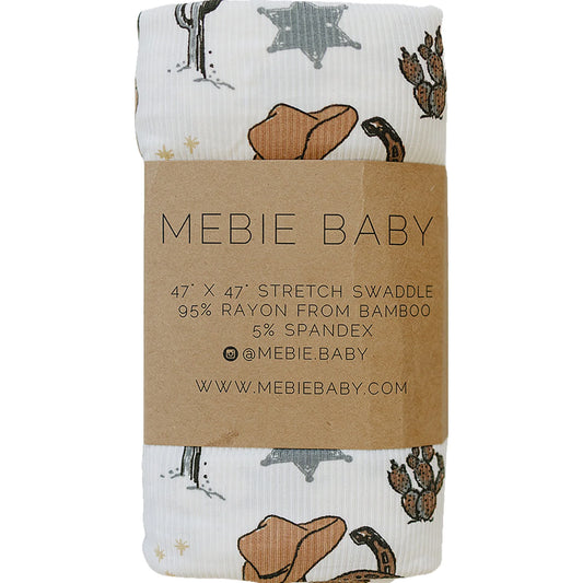 Mebie Baby swaddle blanket with cowboy pattern on a white background