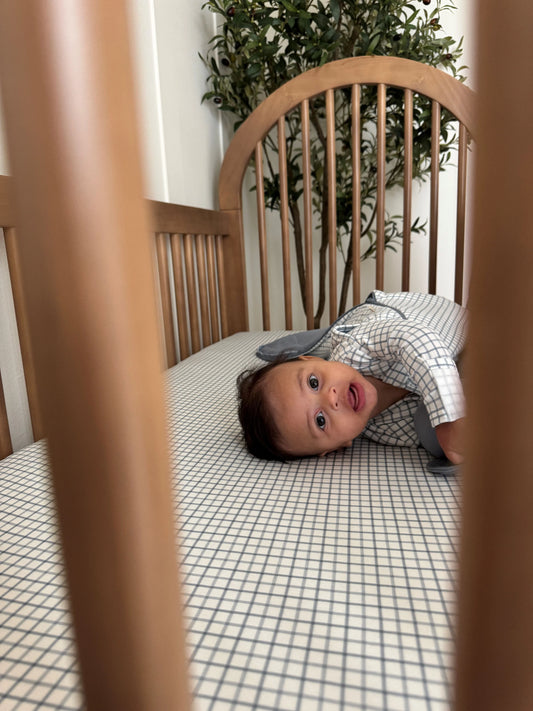 checkered dusty blue crib sheet