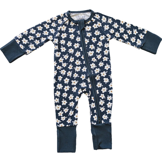 Navy baby onesie with white floral pattern on a white background. Mebie Baby
